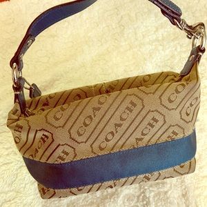 Small tan and teal coach purse